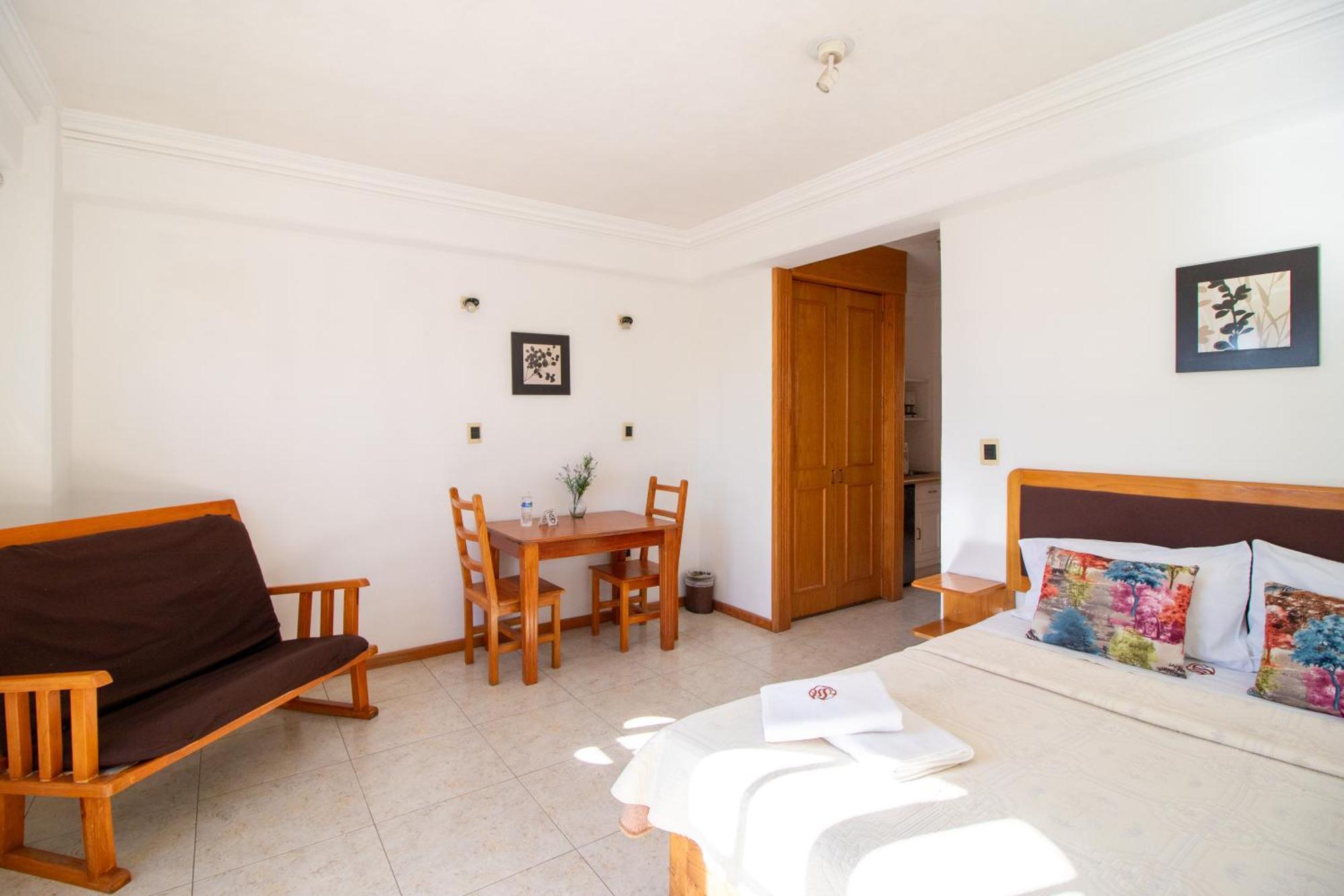 פואבלה Suites Sevilla מראה חיצוני תמונה