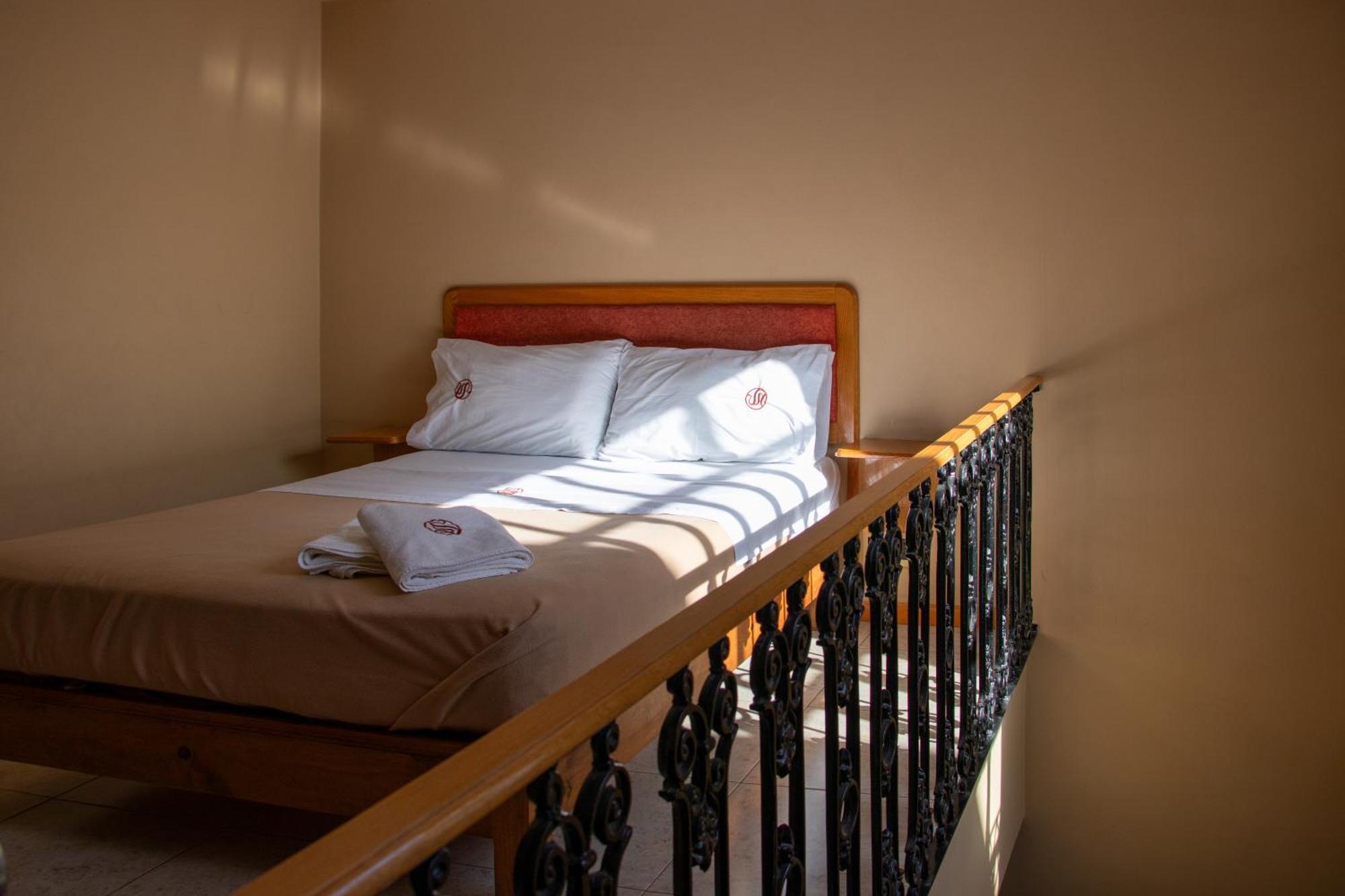 פואבלה Suites Sevilla מראה חיצוני תמונה