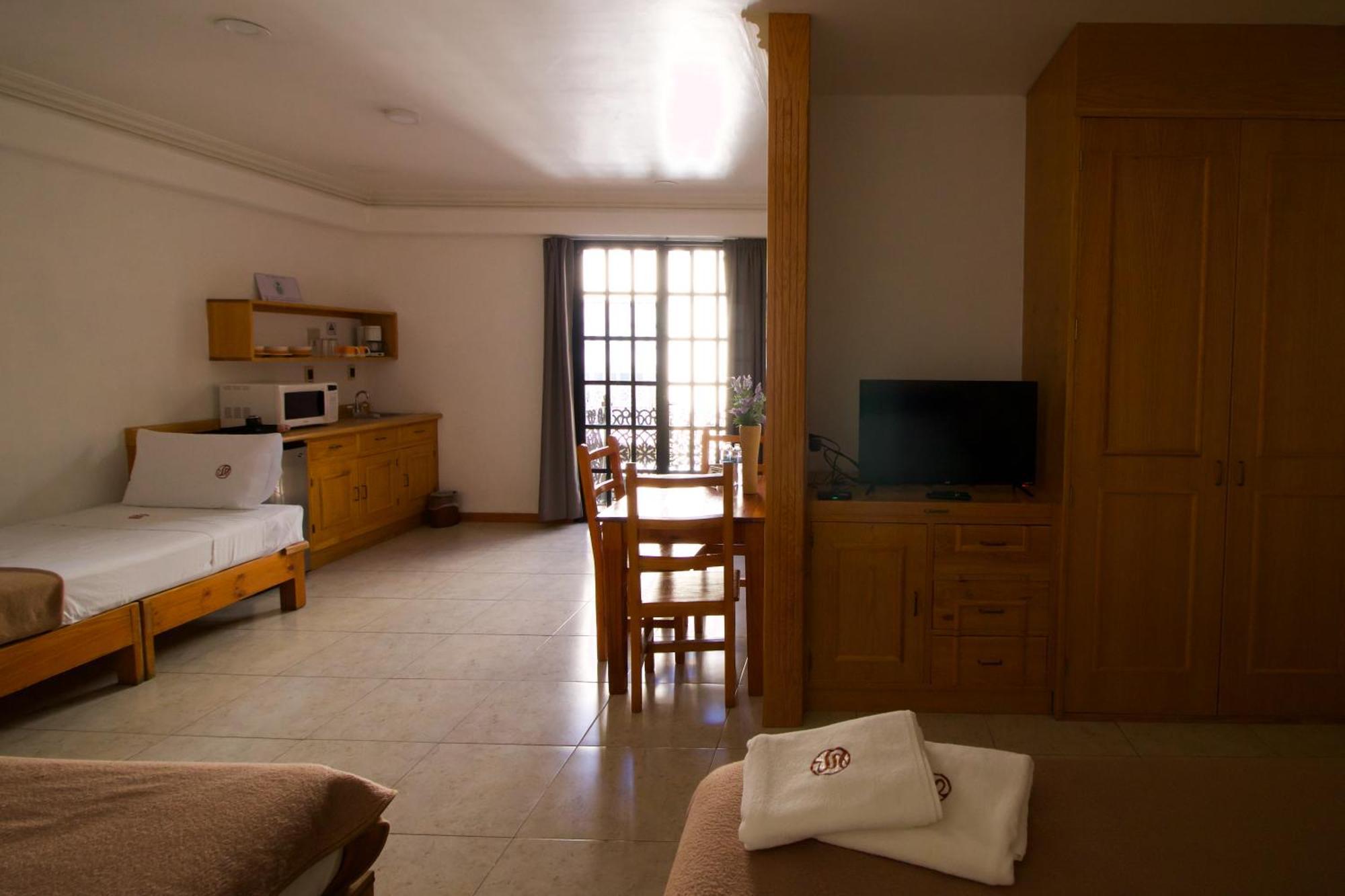 פואבלה Suites Sevilla מראה חיצוני תמונה