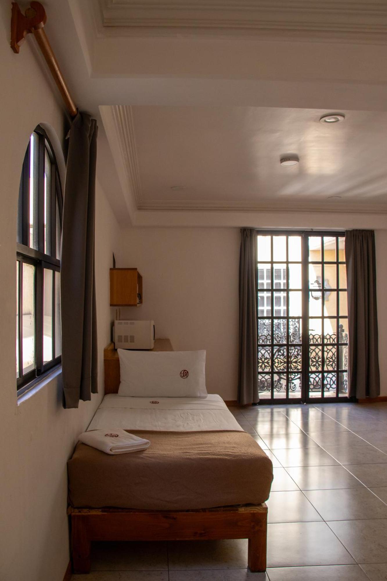 פואבלה Suites Sevilla מראה חיצוני תמונה