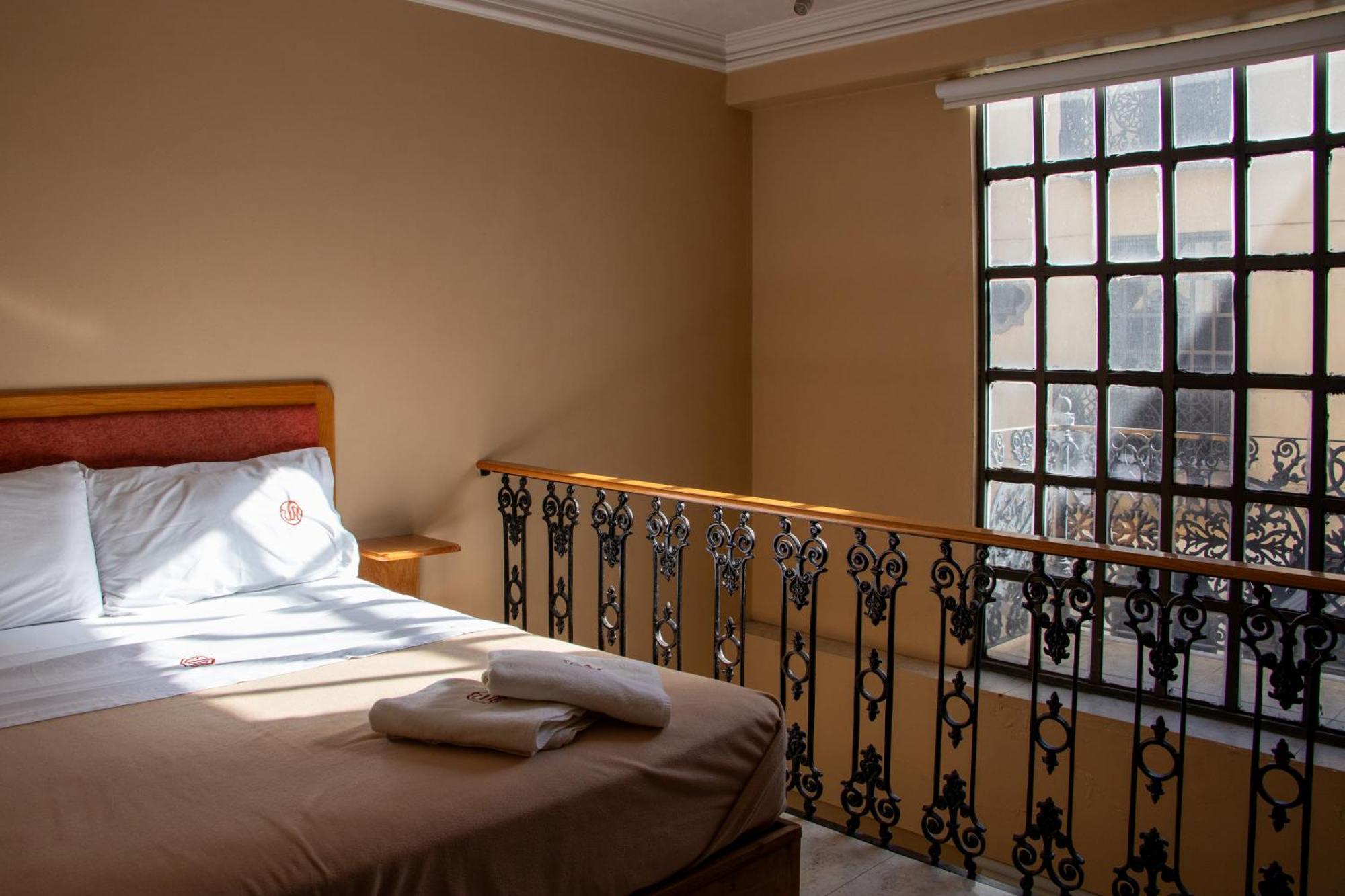 פואבלה Suites Sevilla מראה חיצוני תמונה